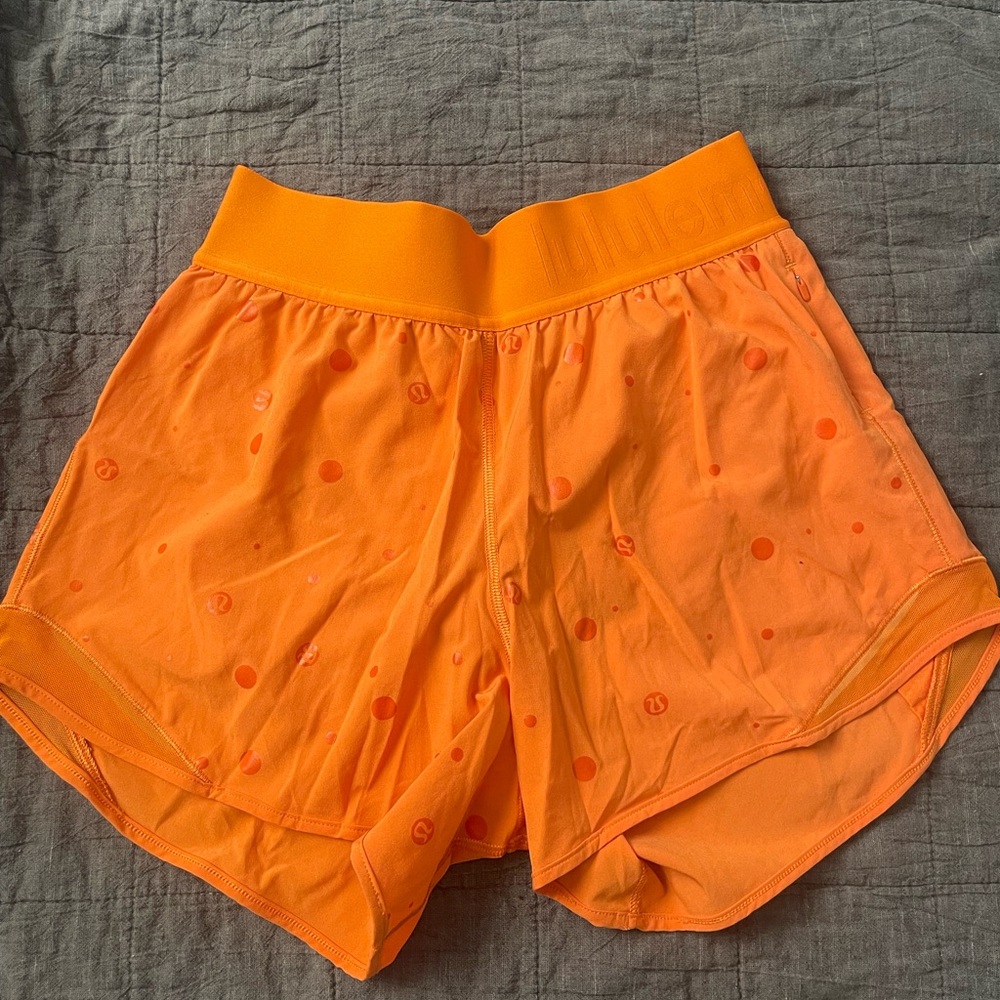 Lululemon Orange running shorts, size 4